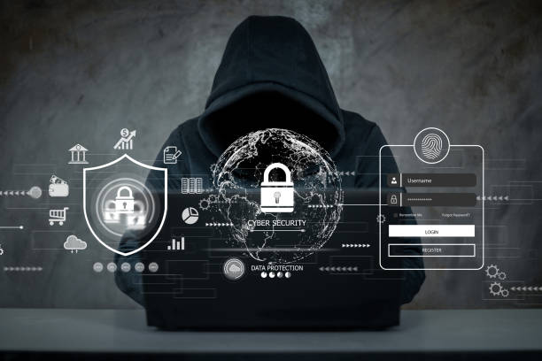 Hacker, hacker hacks network, hacker on a dark background. Dangerous Hooded Hacker Breaks into Government Data Servers